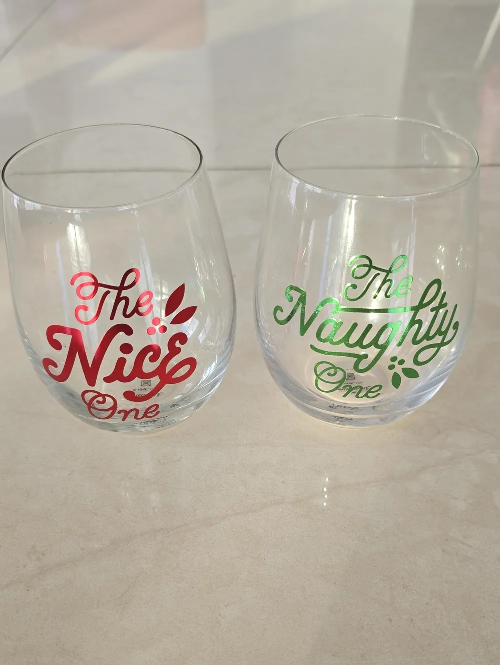 Nice & Naughty Holiday Stemless Wine Glass Set - Two Glasses - Red & Green Font